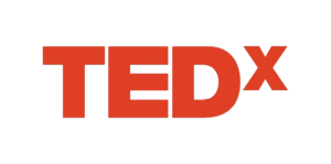 Sam Demma The image shows the TEDx logo with "TED" in bold red letters followed by a smaller red "x" on a light gray background, reflecting platforms where speakers like Sam Demma and Elite Speaker Coaching inspire audiences. Elite Speaker Coaching